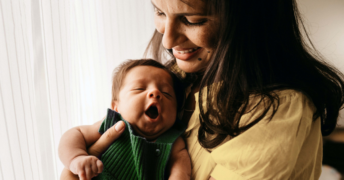 Mother holding newborn baby