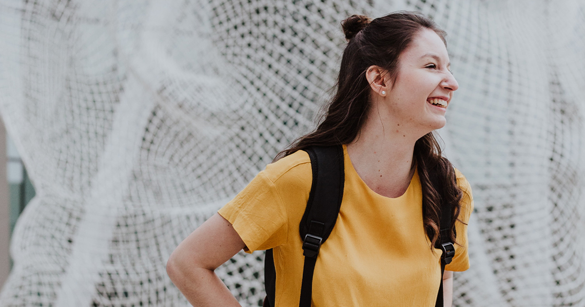 girl wearing yellow shirt outside