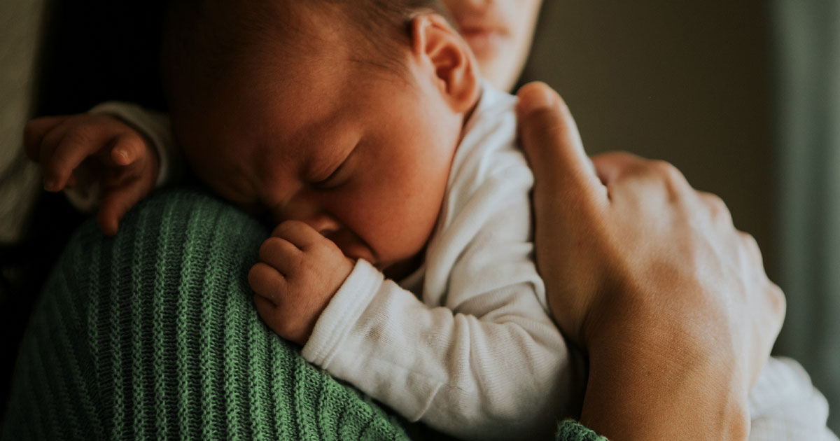 mom holding newborn